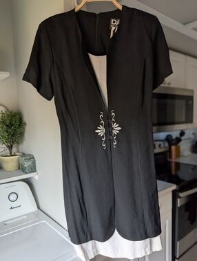 Elegant Black and White Women's Dress With Embroidered Detail